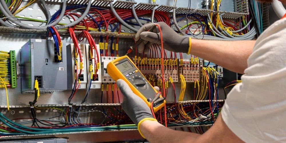 Electrician checking electrical lines.
